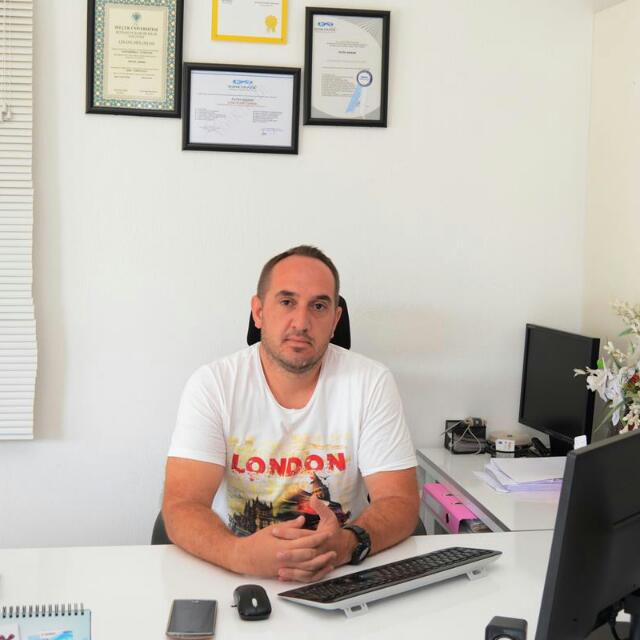 Fatih Akman, founder of AbodeVid, in his real estate office