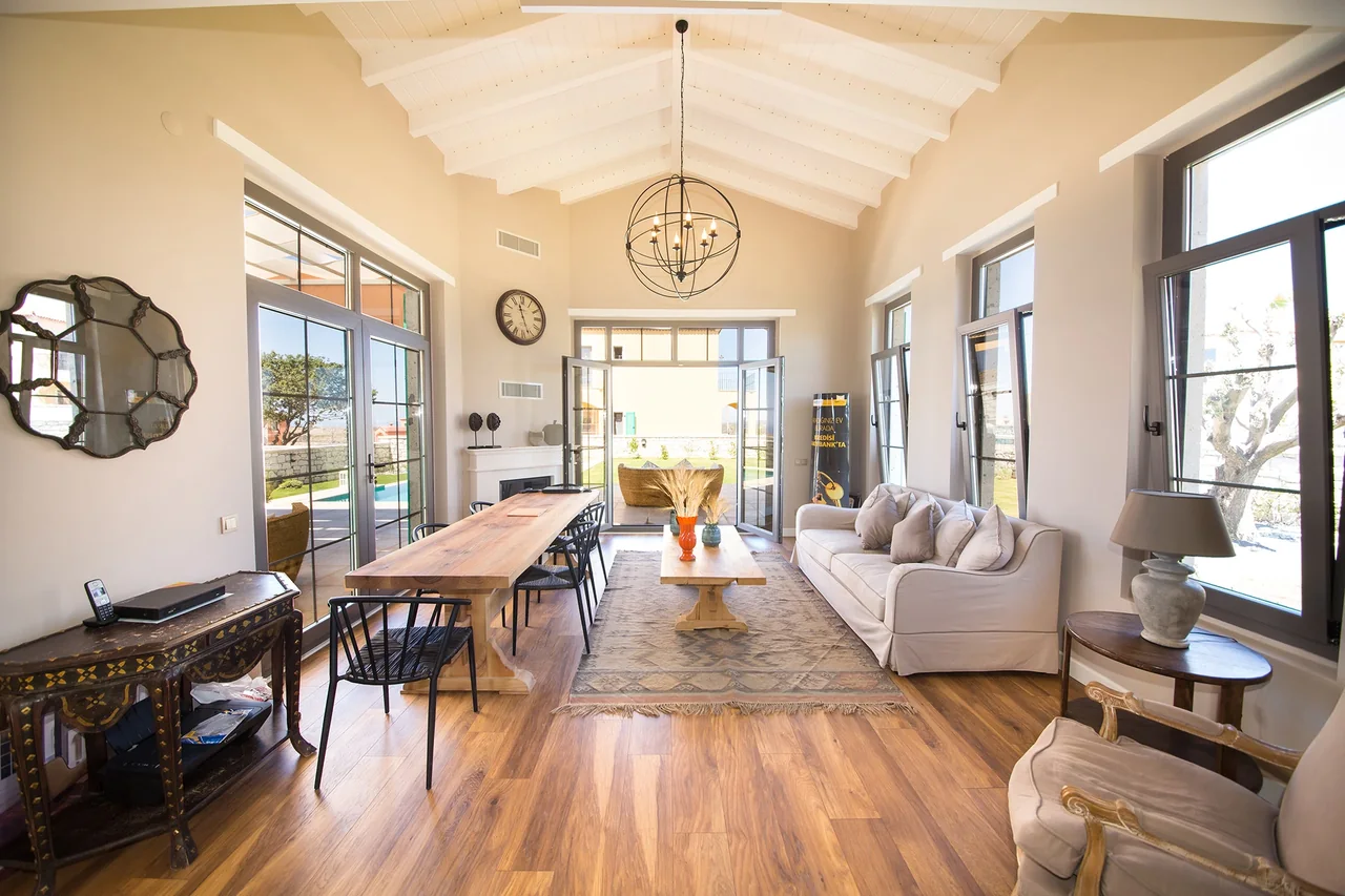 Bright living and dining room listing photo prepared for the finished real estate video