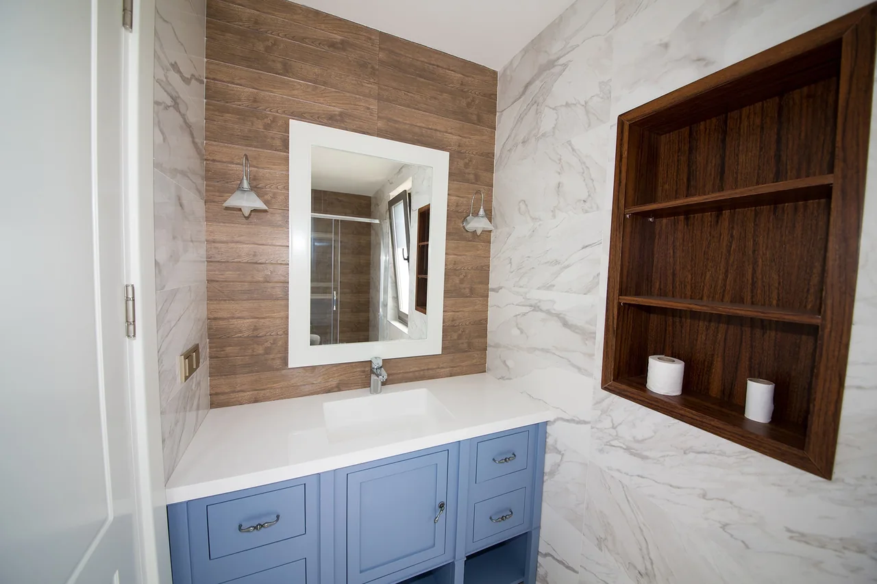 Modern marble bathroom listing photo included in the real estate video sequence