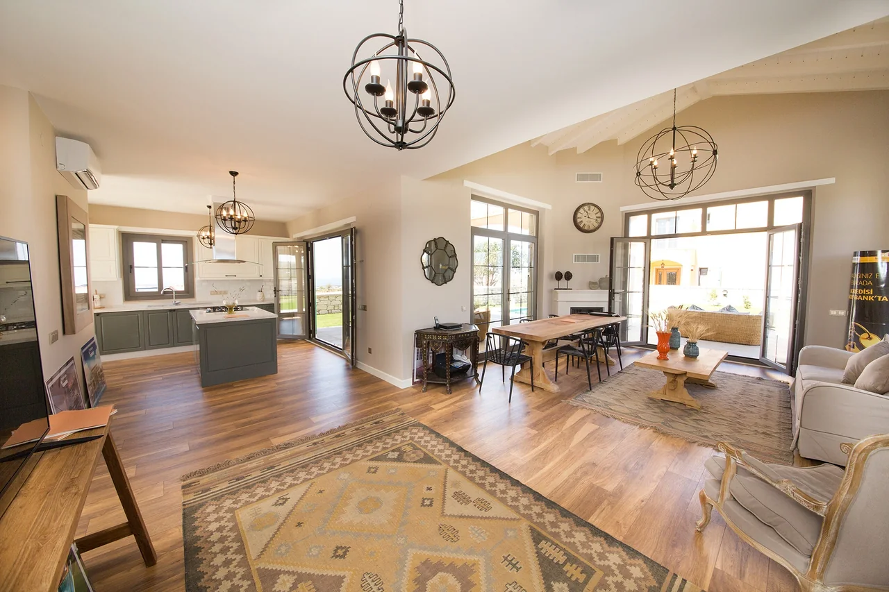 Open-plan kitchen, dining and living room listing photo used in the property video