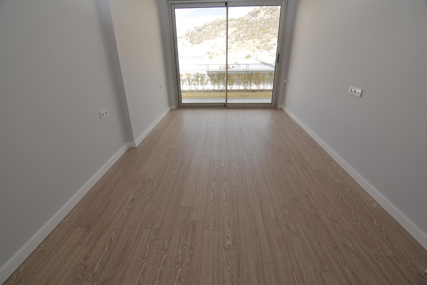 Narrow room with balcony photo