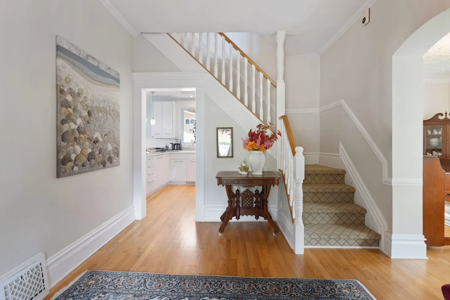 Bright entrance hall and staircase listing photo used in a vertical property Reel