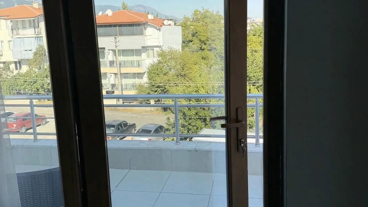 Motion-constrained property photo example 2: Balcony door photographed too close