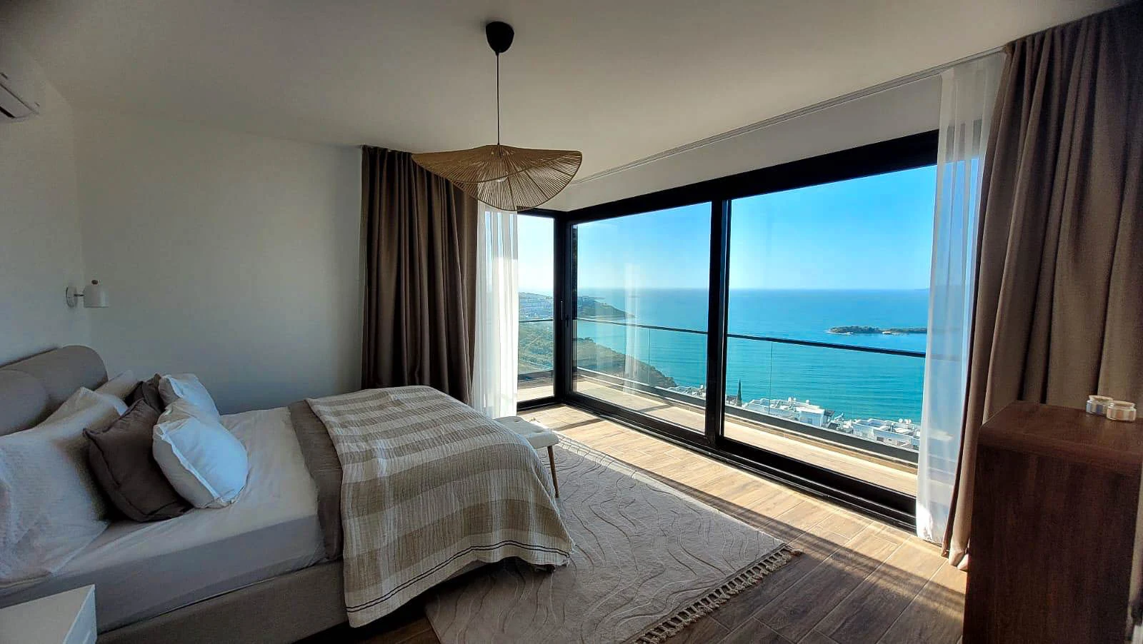 Sea-view bedroom listing photo included in the 1:1 square property video example